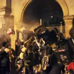 Georgia parliament cancels session after building damaged during huge protests