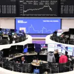 European shares end flat as investors await for inflation test