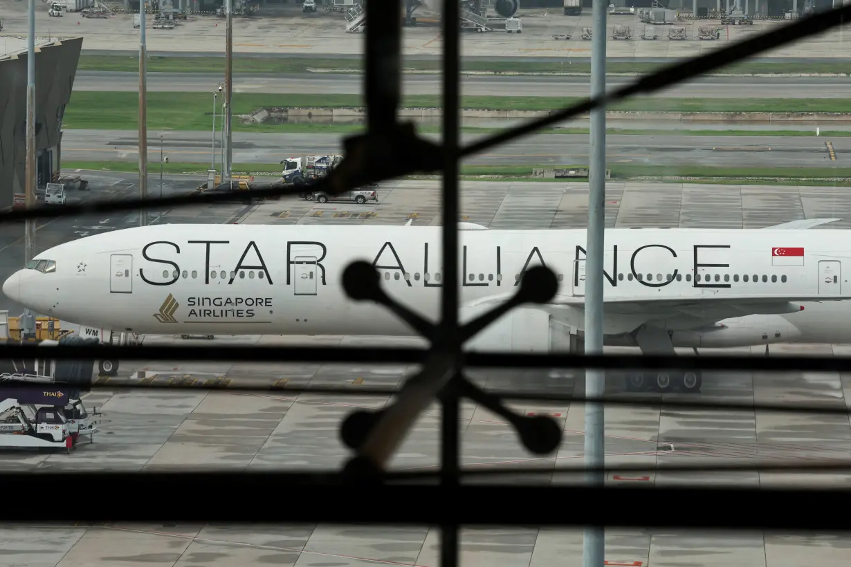 Singapore Airlines aircraft for flight SQ321 is parked on the tarmac after an emergency landing at Suvarnabhumi International Airport