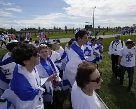 The yearly memorial march at the former death camp at Auschwitz overshadowed by the Israel-Hamas war
