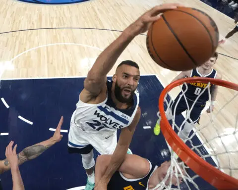 NBA fines Gobert $75,000 for making another money gesture in frustration over a foul call