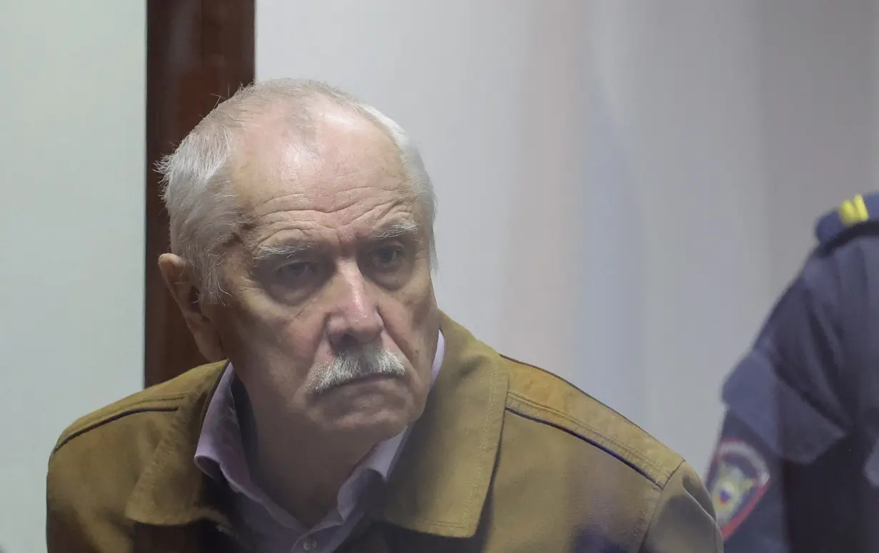 Russian physicist Maslov accused of state treason appears in court in St Petersburg