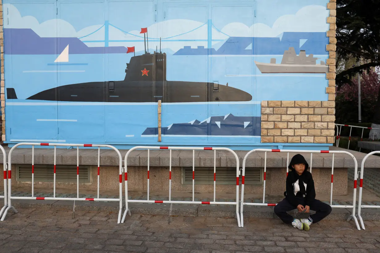 Chinese People's Liberation Army (PLA) Navy opens warships for public viewing in Qingdao