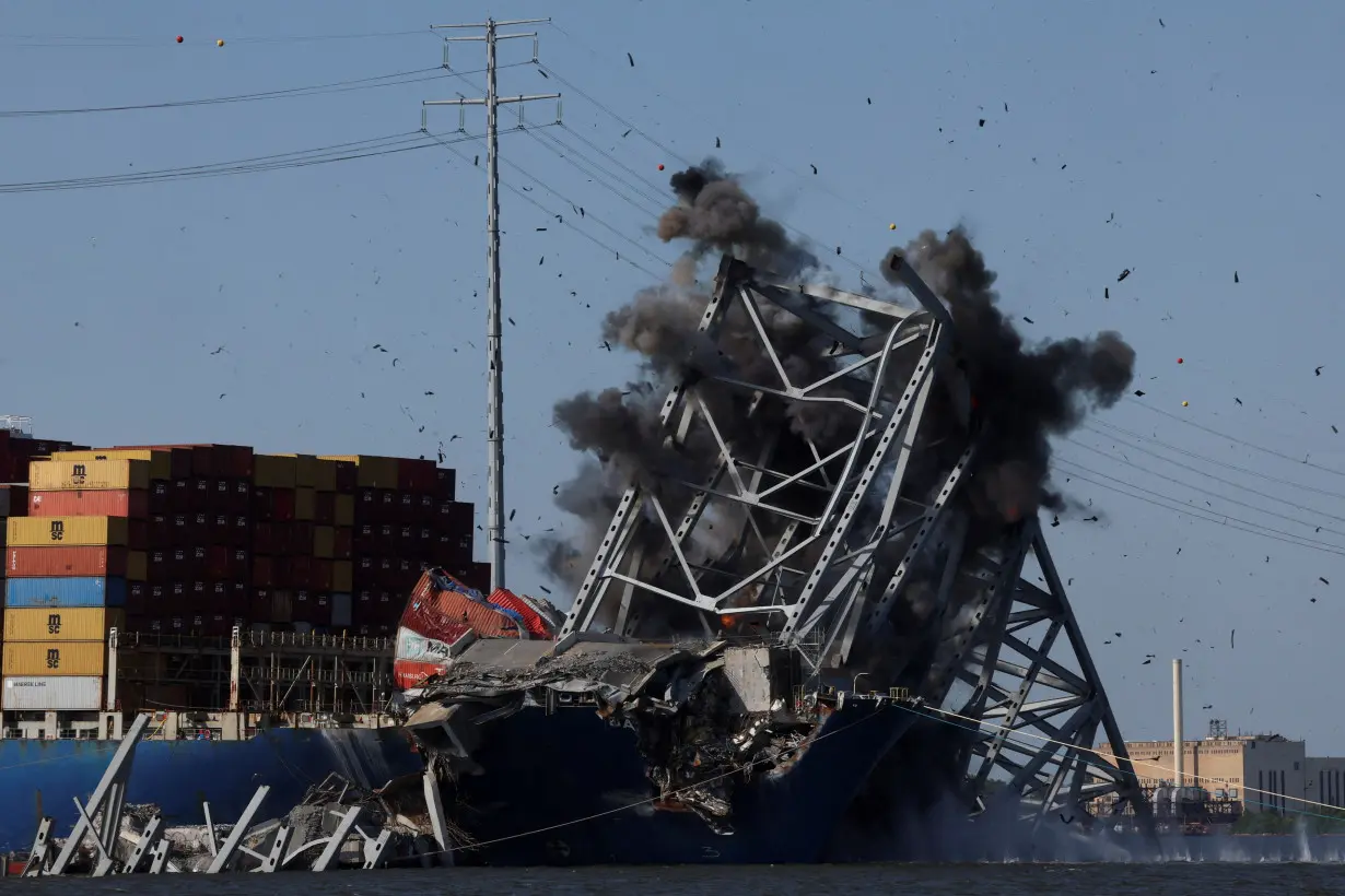 Explosives are detonated to free container ship Dali from Baltimore bridge collapse, in Baltimore