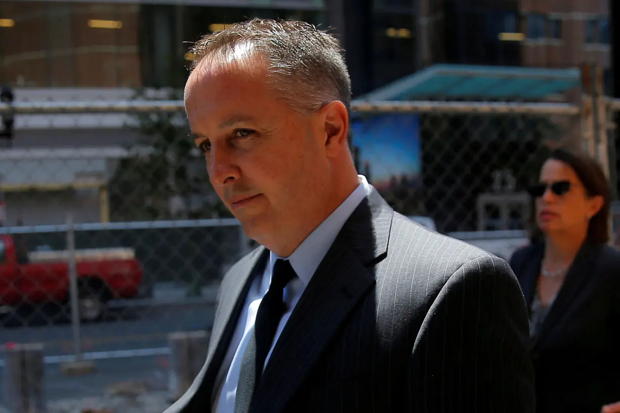 FILE PHOTO: Pharmacist Barry Cadden, co-founder of the now-defunct New England Compounding Center, arrives to be sentenced in Boston