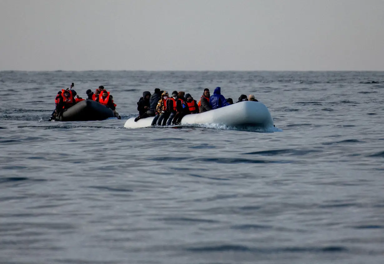 FILE PHOTO: Migrants cross the English Channel in small boats