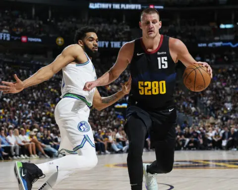 Edwards leads Wolves back from 20-point deficit for 98-90 win over defending NBA champion Nuggets