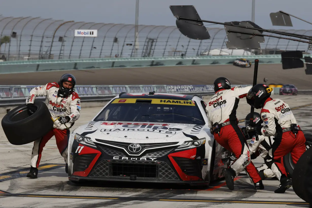 Truex wins pole at Martinsville as he again faces championship elimination in NASCAR playoffs