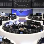 Upbeat earnings lift European shares to record high ahead of US inflation data