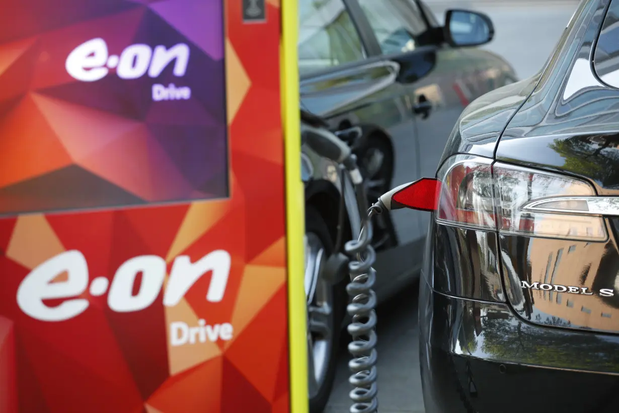 Electric car is charged at the charging station at the front of the German utility E.ON headquarters in Essen