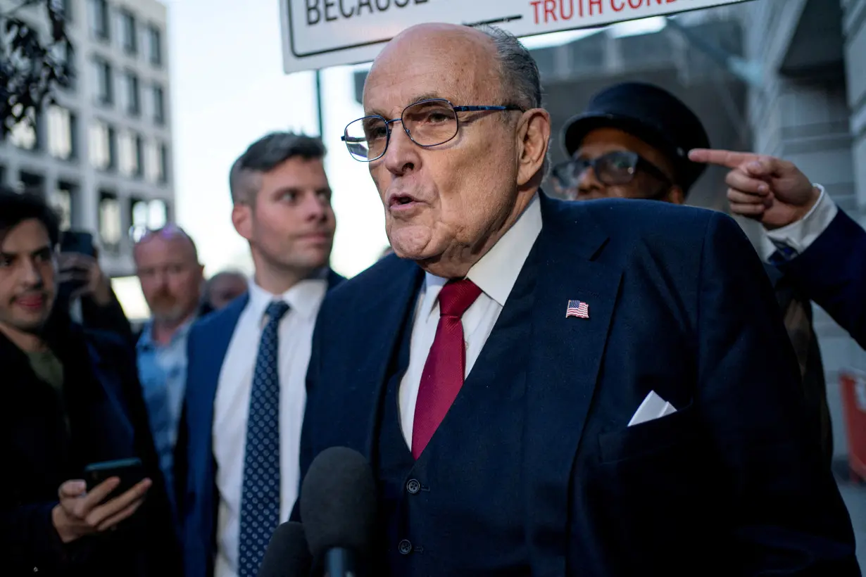 FILE PHOTO: Former New York Mayor Rudy Giuliani departs defamation lawsuit at the District Courthouse in Washington