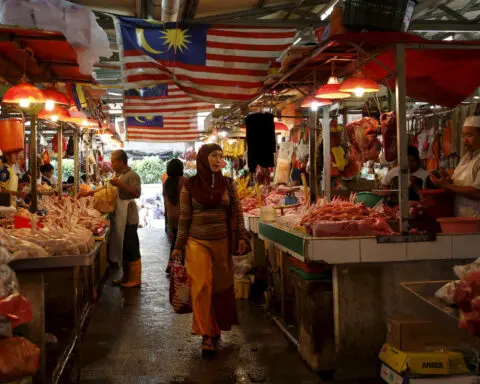 Malaysia's economy grows faster than expected, inflation risks cloud outlook