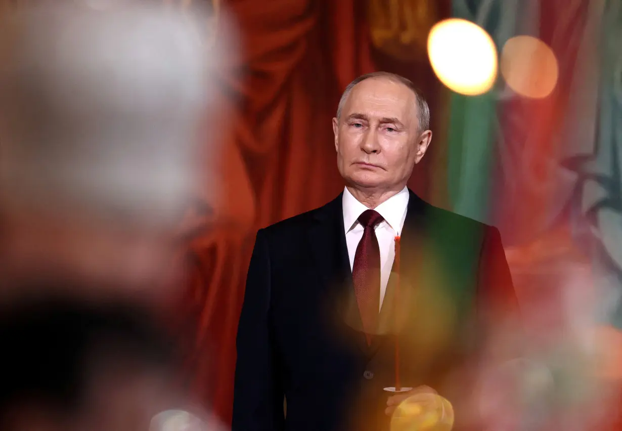 FILE PHOTO: Russian President Putin attends Orthodox Easter service