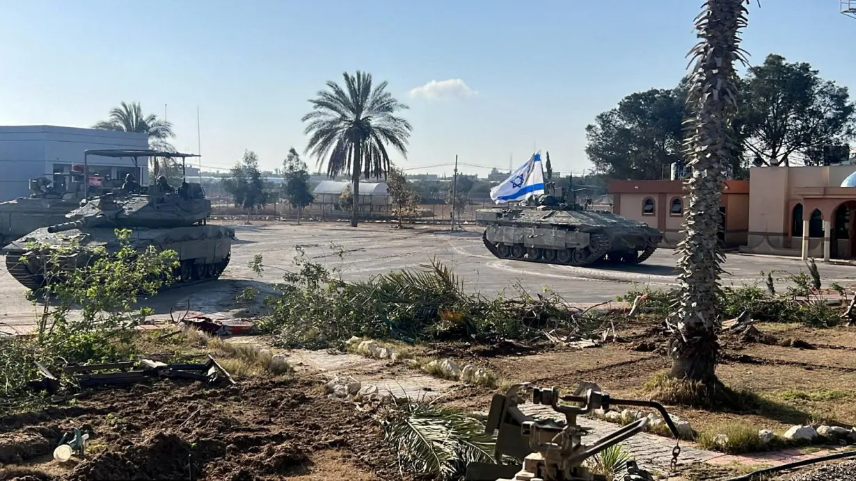 FILE PHOTO: Israeli military vehicles operate in the Gazan side of the Rafah Crossing