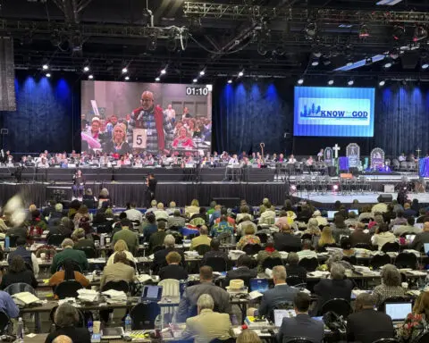 United Methodist delegates repeal their church’s ban on its clergy celebrating same-sex marriages