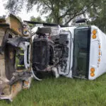 8 dead, at least 40 injured as farmworkers' bus overturns in central Florida; truck driver arrested