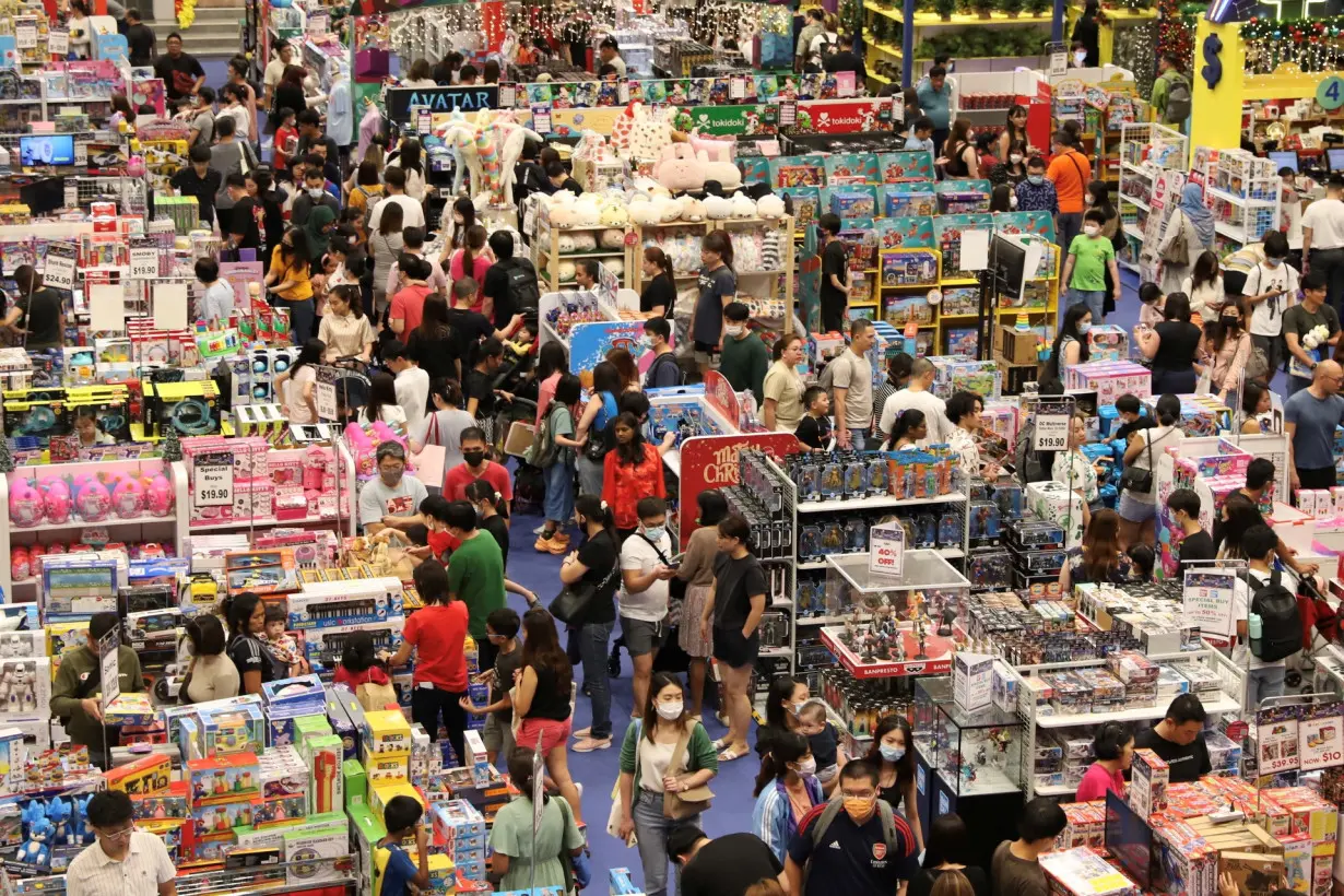 Shoppers browse merchandise in a shopping mall on Orchard Road