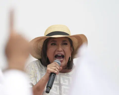 A violent, polarized Mexico goes to the polls to choose between 2 women presidential candidates