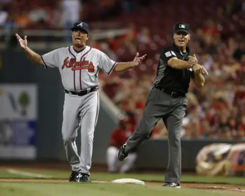 Scorned umpire Ángel Hernández, who unsuccessfully sued MLB for racial discrimination, retires