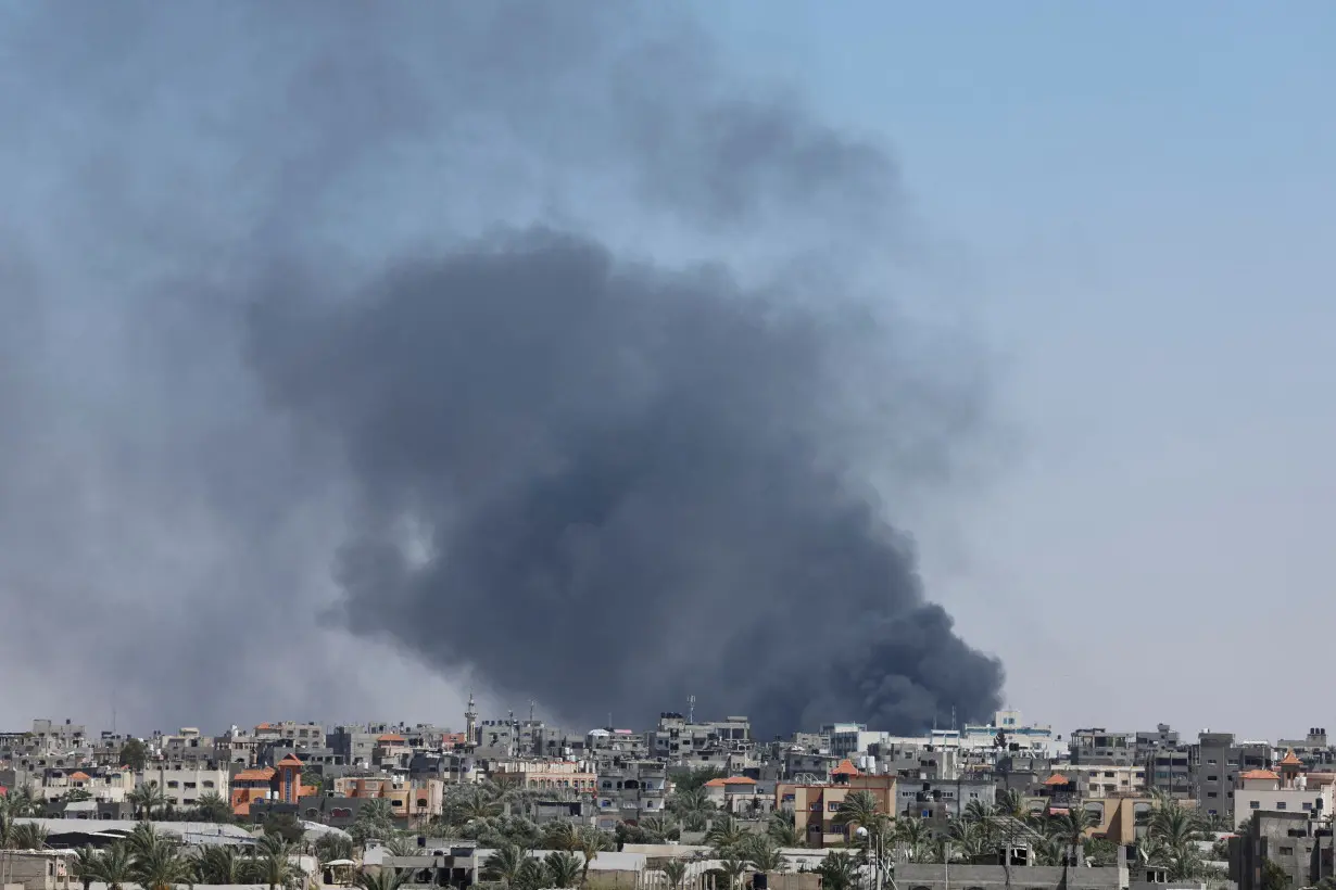 Smoke rises during an Israeli air strike, in Rafah