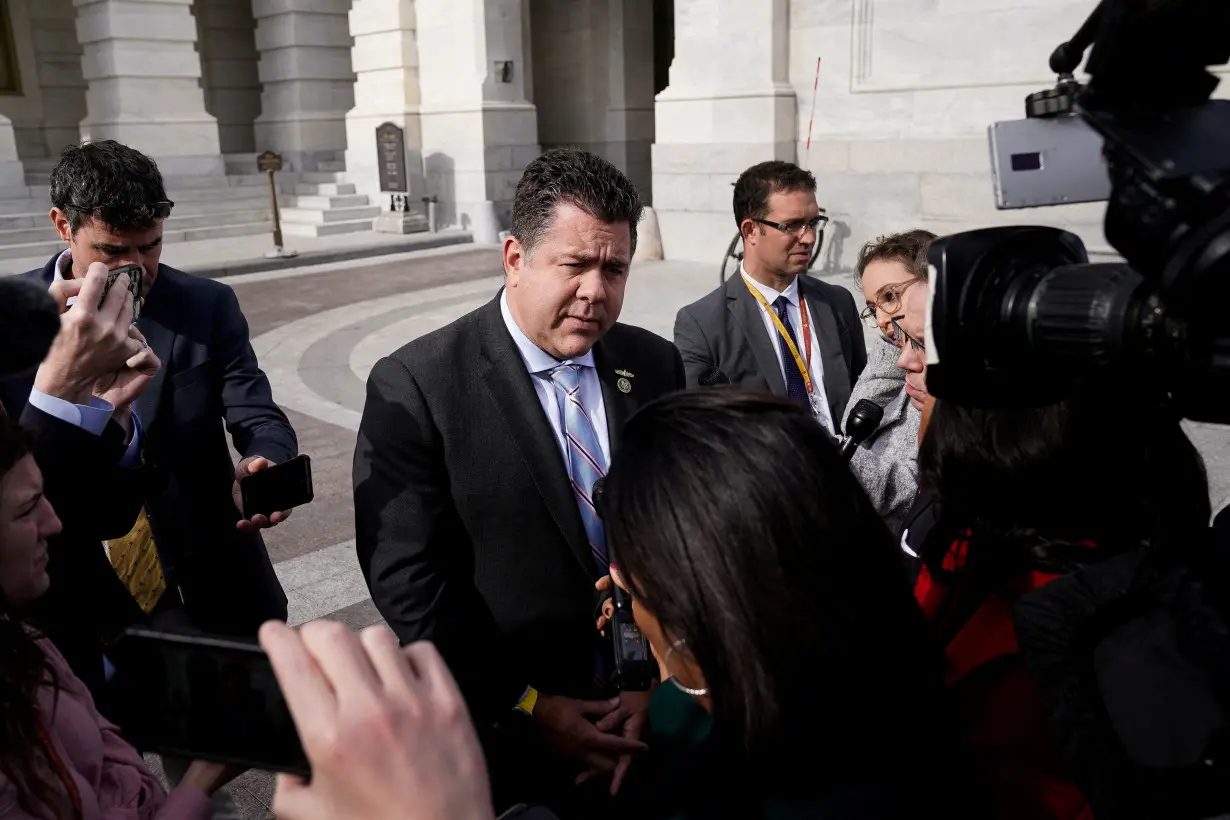 FILE PHOTO: Members of the U.S. House of Representatives leave the Capitol after a series of votes, in Washington