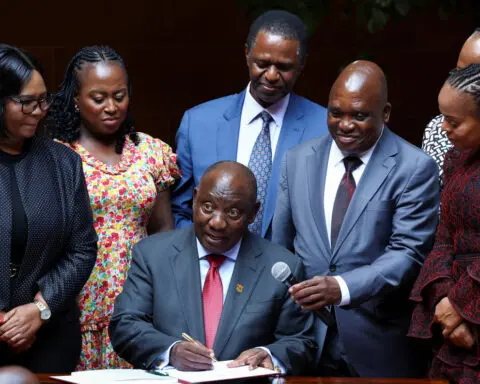 South Africa's president signs major health bill just before election