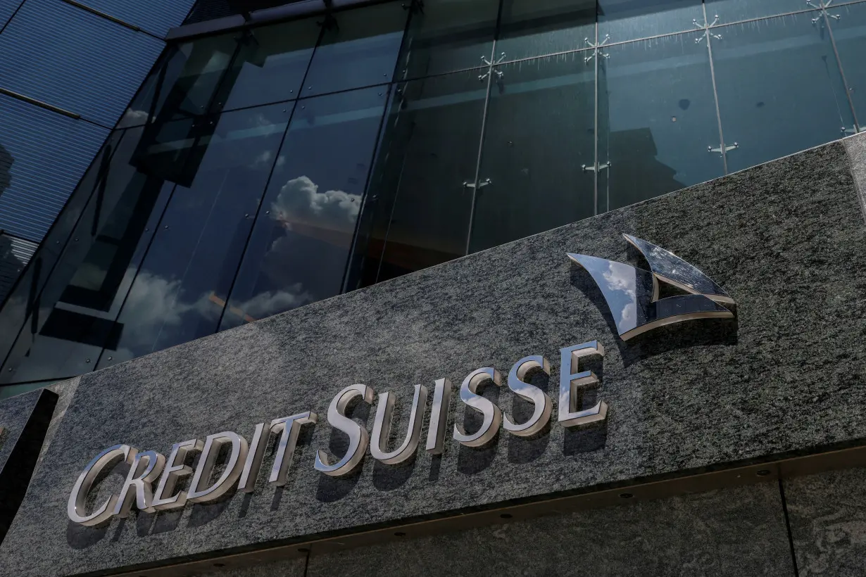 FILE PHOTO: The logo of Credit Suisse is seen outside its office building in Hong Kong