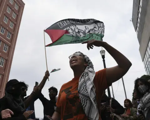Police clear pro-Palestinian protest camp and arrest 33 at DC campus as mayor's hearing is canceled