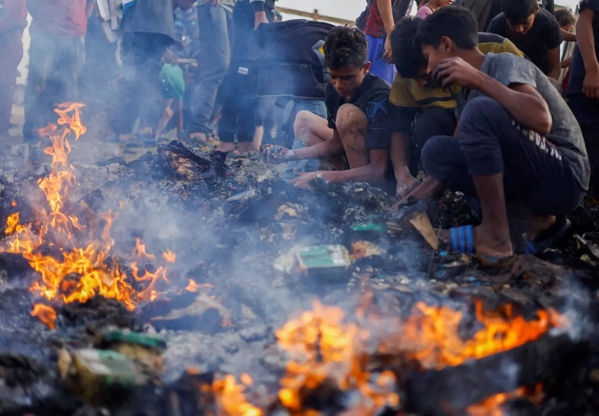 Aftermath of an Israeli strike on an area designated for displaced people, in Rafah in the southern Gaza Strip