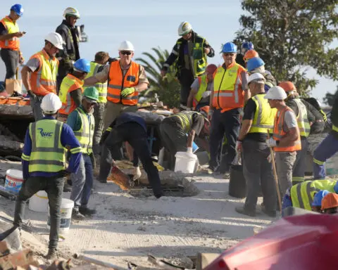 Survivors rescued but dozens still trapped after a deadly building collapse in South Africa