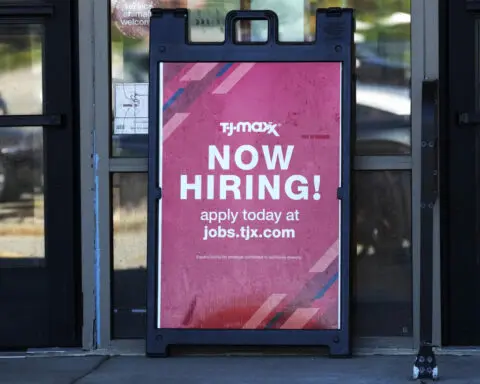 The number of Americans applying for jobless benefits inches up, but layoffs remain low