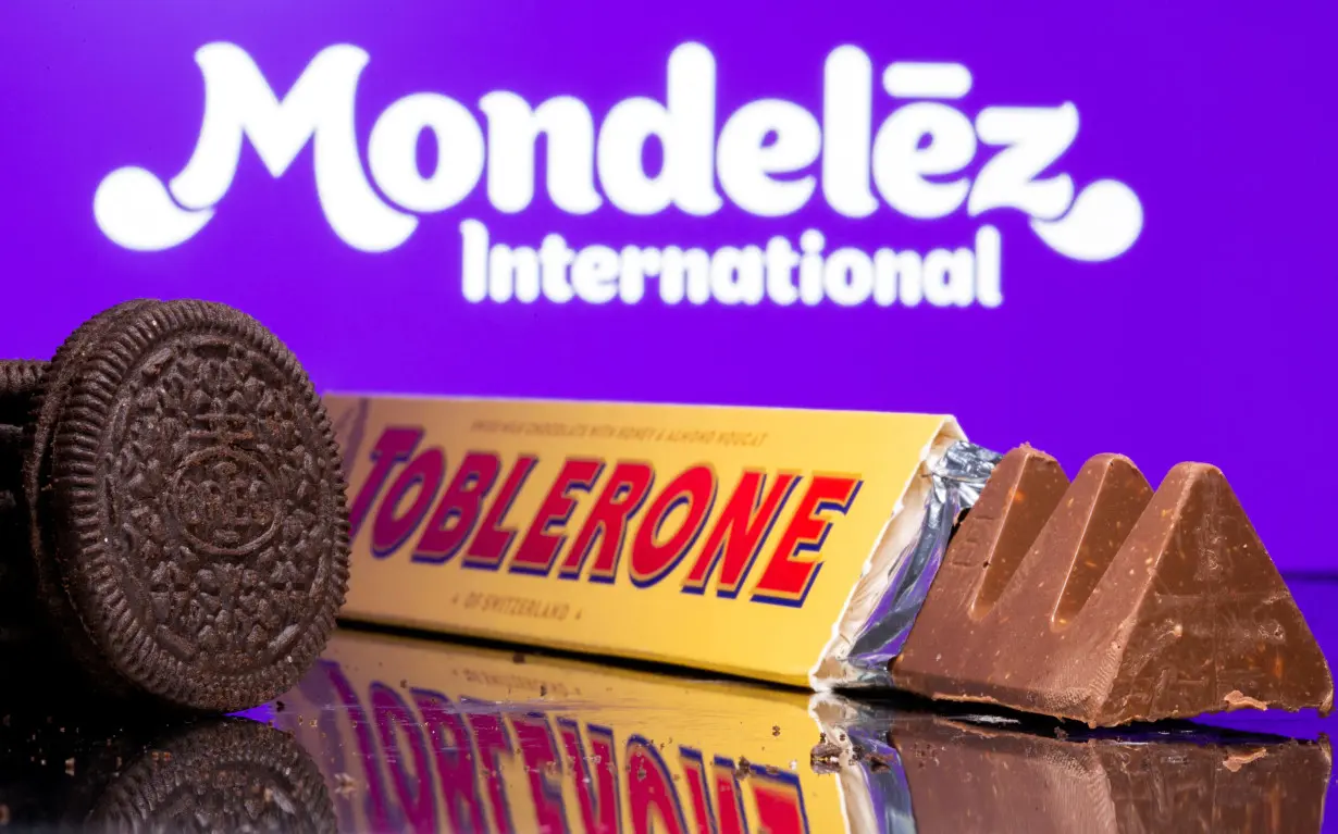 FILE PHOTO: Oreo biscuits and a Toblerone Swiss milk chocolate are seen displayed in front of Mondelez International logo in this illustration picture