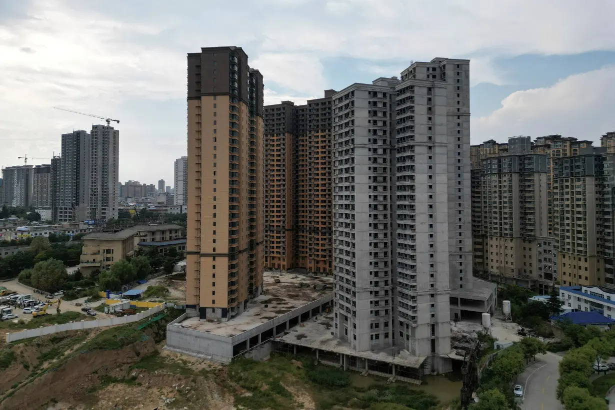 FILE PHOTO: Aerial view shows unfinished residential buildings of the Gaotie Wellness City complex in Tongchuan