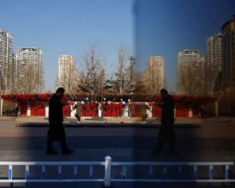 China's economy to improve further, stats bureau says