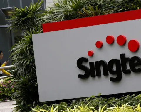 SingTel annual profit more than halves on $2.3 billion impairment hit