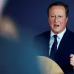 UK system of arms exports to Israel not the same as U.S., Cameron says