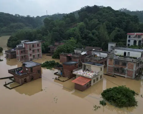 Floods swamp southern China, spark extreme weather fears