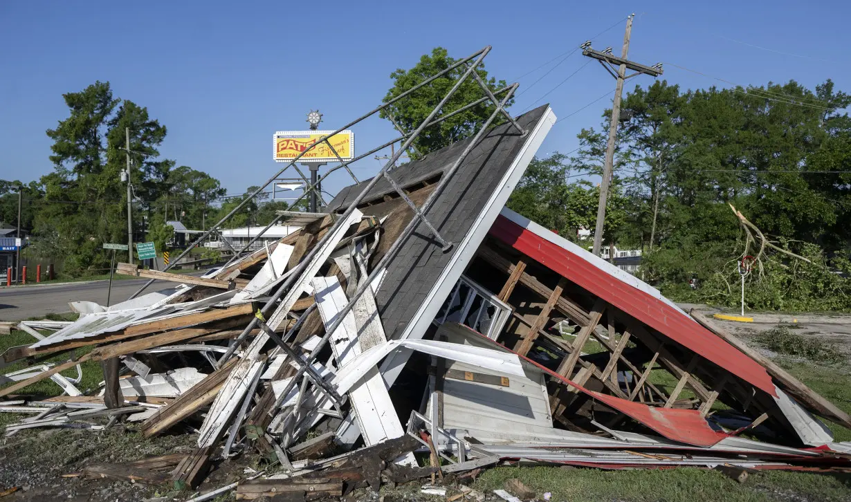 Storms kill a pregnant woman in Louisiana, adding to the region's recent weather woes