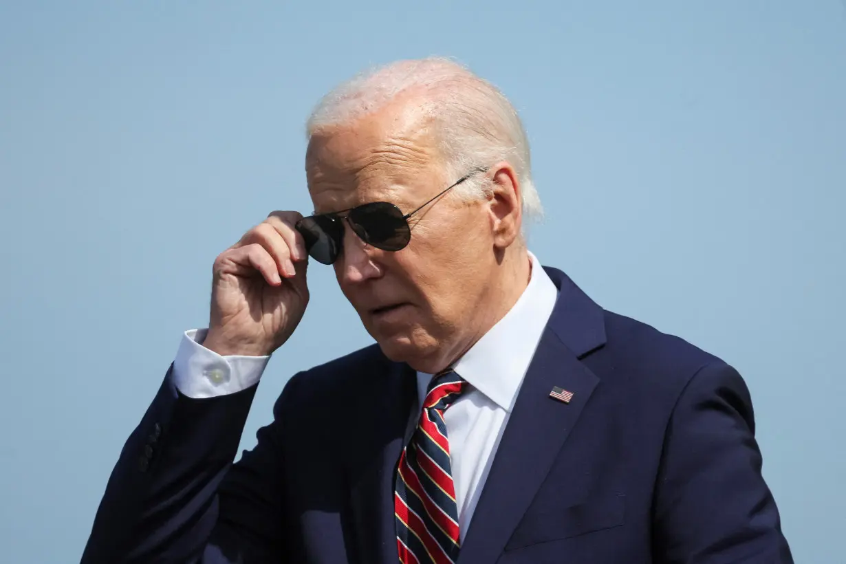 FILE PHOTO: U.S. President Joe Biden arrives at Boston Logan International Airport