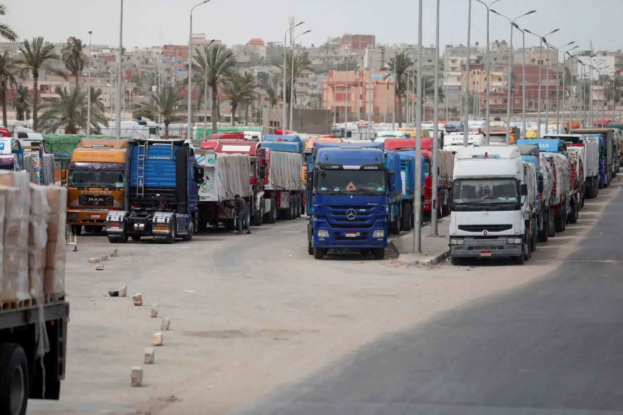 FILE PHOTO: Trucks stand at the Rafah border crossing between Egypt and the Gaza Strip