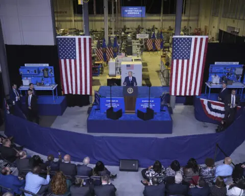 Biden lauds new Microsoft center on the same site where Trump's Foxconn project failed