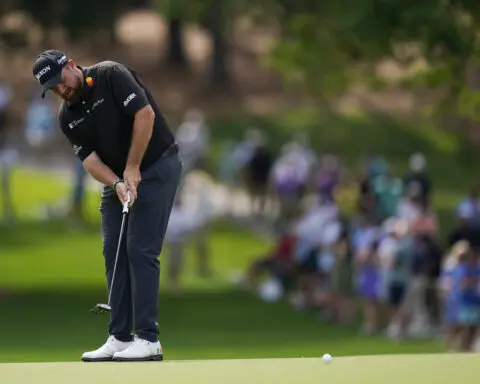 Shane Lowry ties a major championship record by shooting a 9-under 62 to get into the mix at the PGA