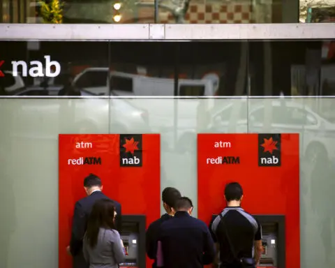 Aussie lender NAB reports lower profit but hints bank margin squeeze is easing