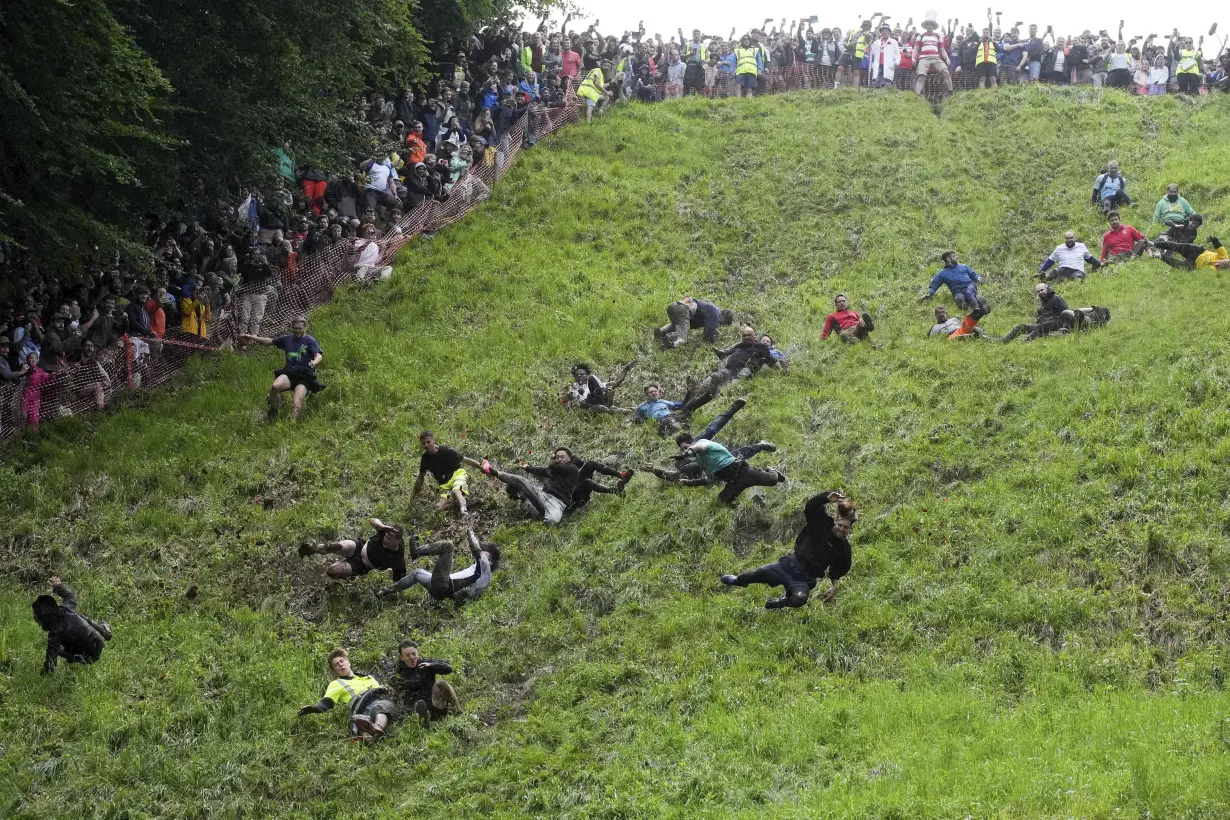 Chasing cheese wheels or lugging sacks of wool, UK competitors embrace quirky extreme races