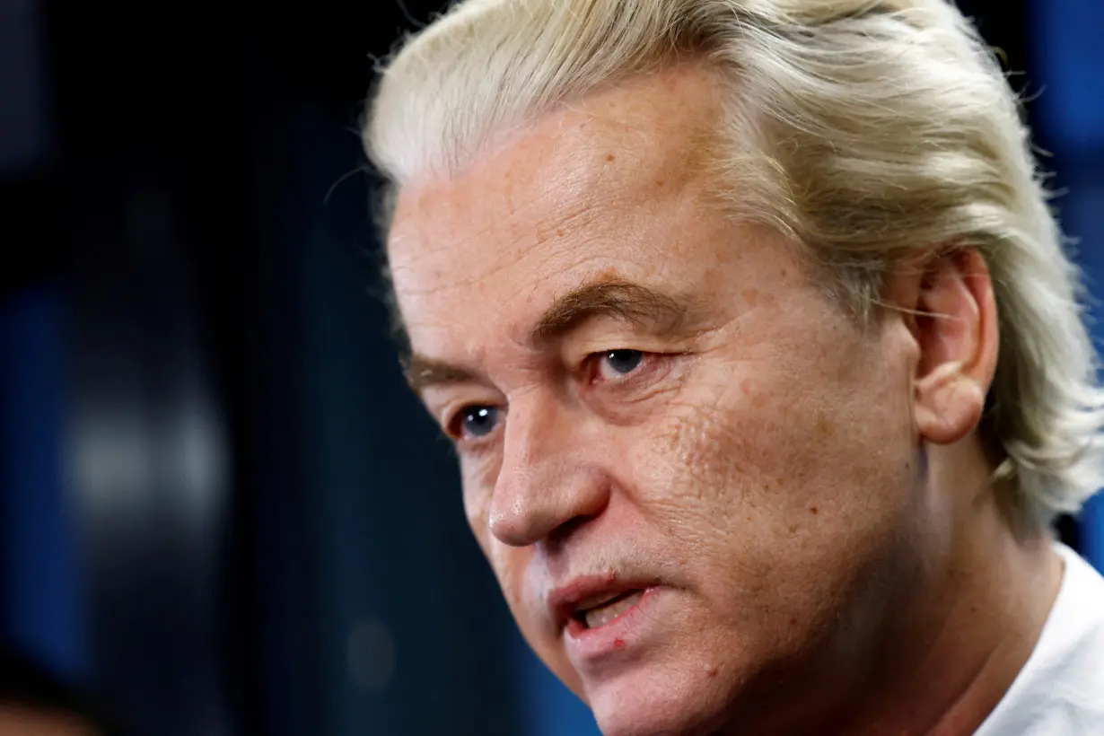 FILE PHOTO: Dutch far-right politician and leader of the PVV party Geert Wilders reacts as he meets the press