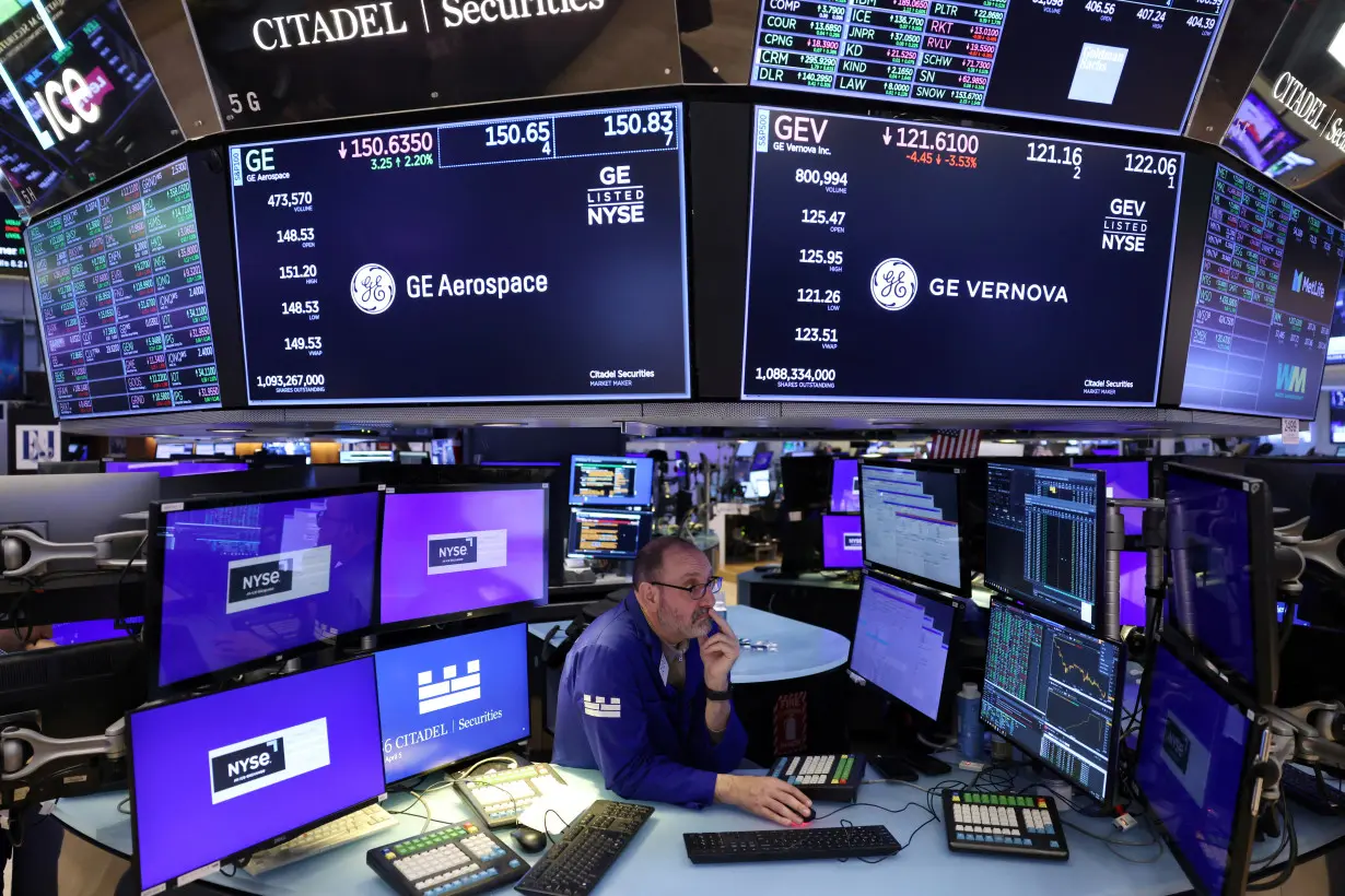 A trader works on the trading floor at the New York Stock Exchange (NYSE) in New York City