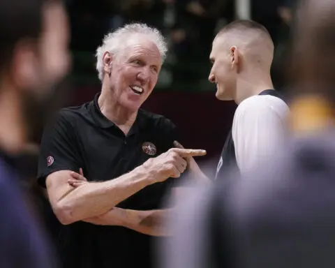 Bill Walton, Hall of Fame player who became a star broadcaster, dies of cancer at 71