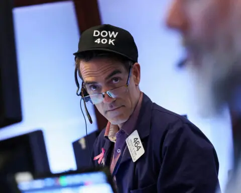 Dow sprints past 40,000-mark on earnings boost, rate-cut bets