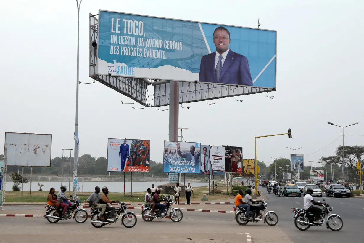 FILE PHOTO: A billboard of Gnassingbe is pictured on a street in Lome