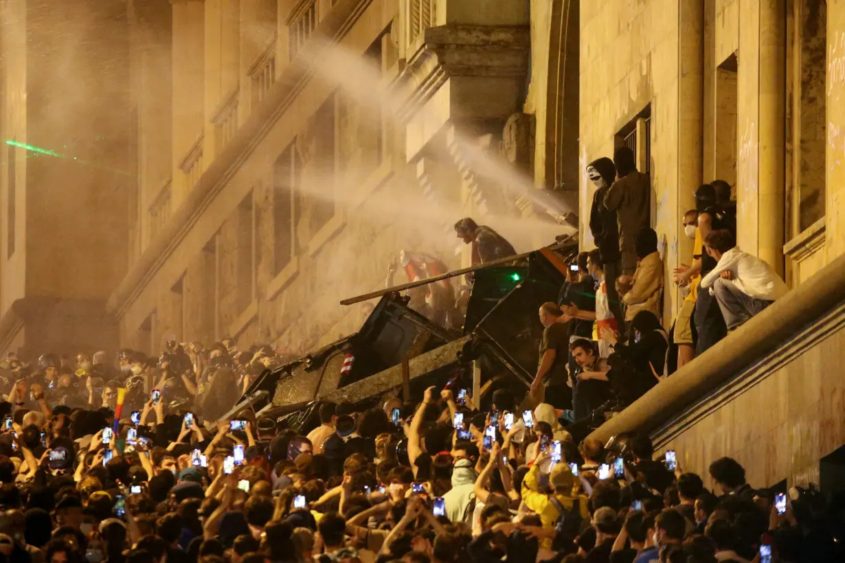 Demonstrators hold a rally to protest against a bill on 